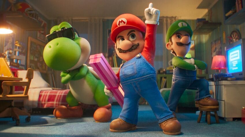 Jornalista segurando um exemplar de Super Mario Galaxy ao lado de um gráfico de bilheteria em ascensão.