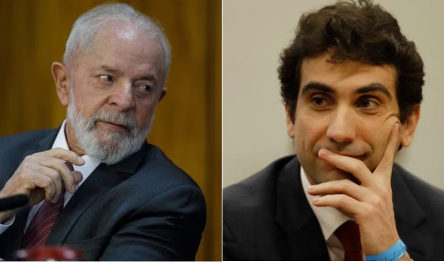 Político Galípolo sentado em uma reunião no Planalto, com um papel na mão.