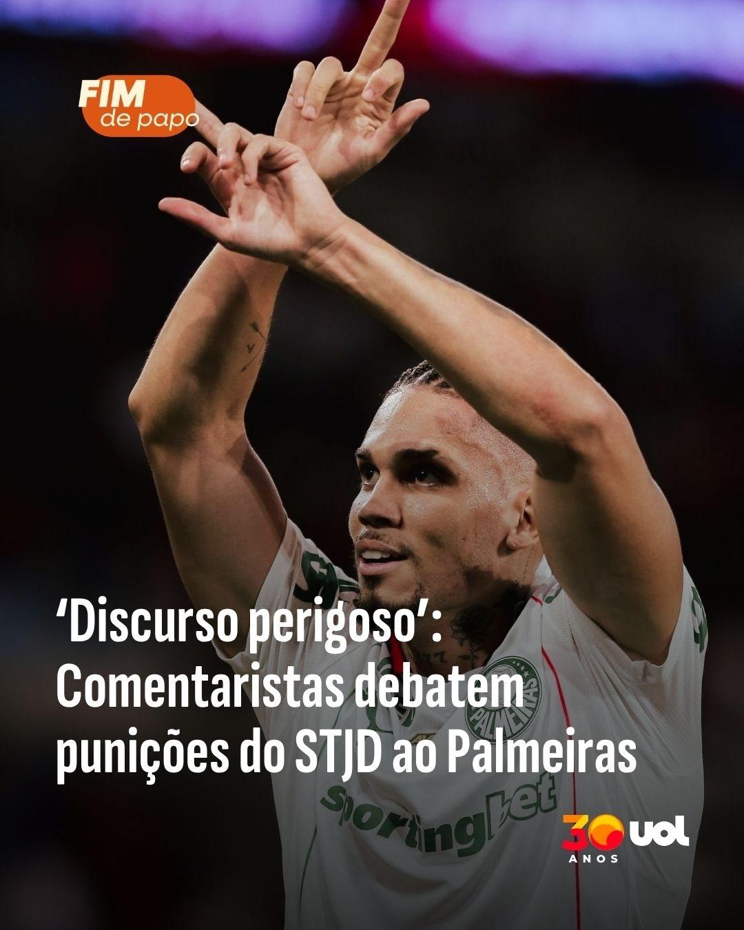 Jogador de futebol uruguaio sentado em campo, com expressão de dor, enquanto assistente médico o examina.